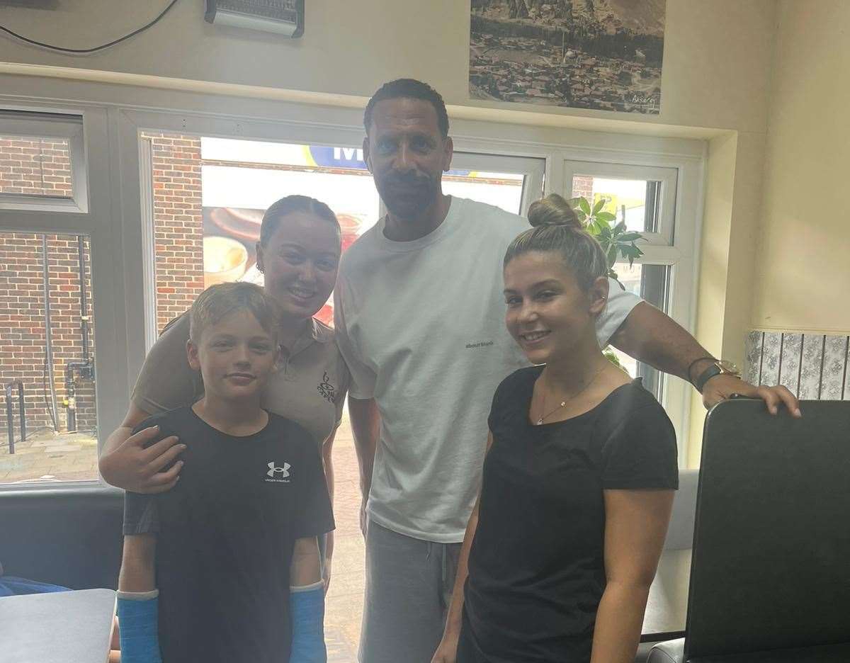 Rio Ferdinand with the staff at Parkwood Cafe in Rainham. Picture: Parkwood Cafe