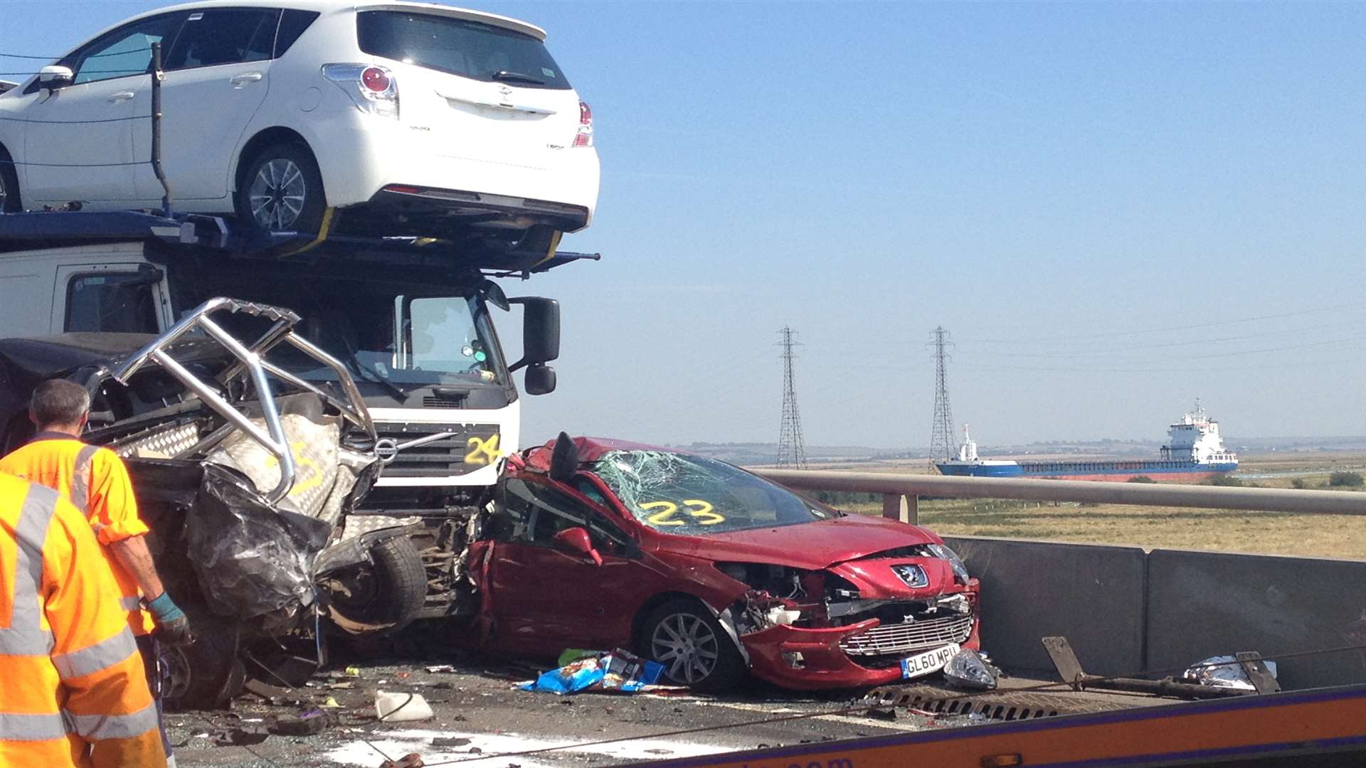 Wrecked vehicles on a car transporter involved in the accident