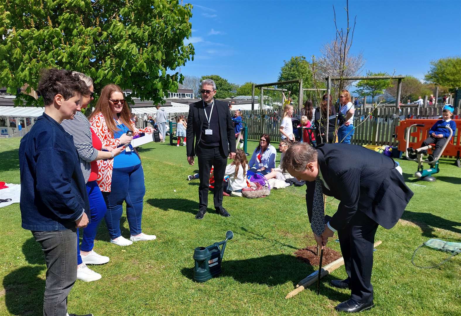 Lord Northbourne plants the tree for the coronation celebrations. Picture: Downs CEP School