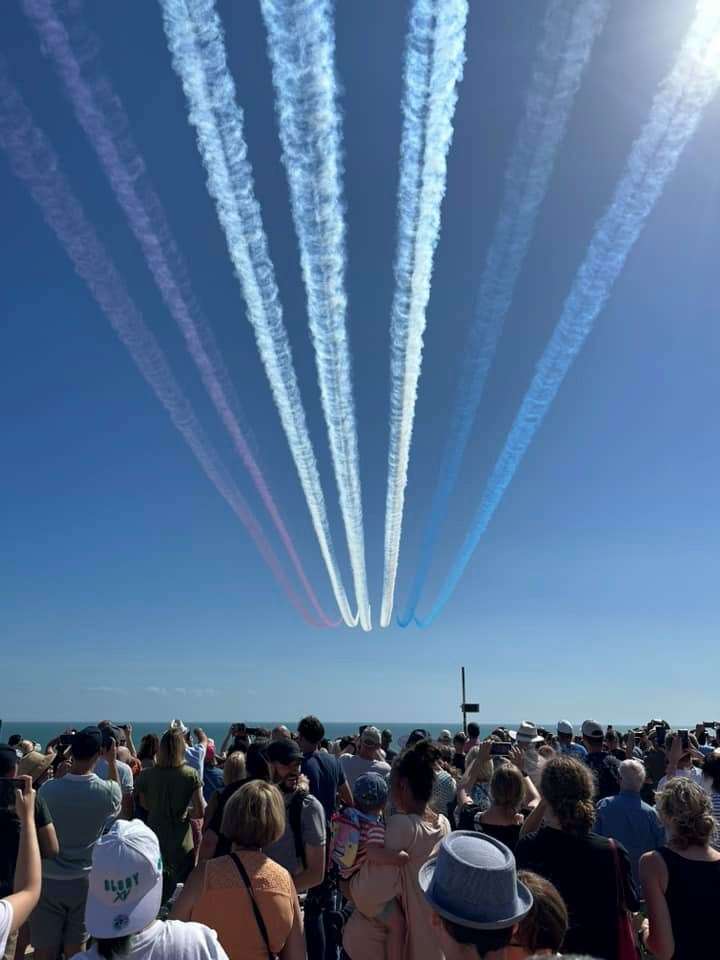 The crowd in Folkestone watches on as the Red Arrows soar overhead. Picture: Paul McKeating