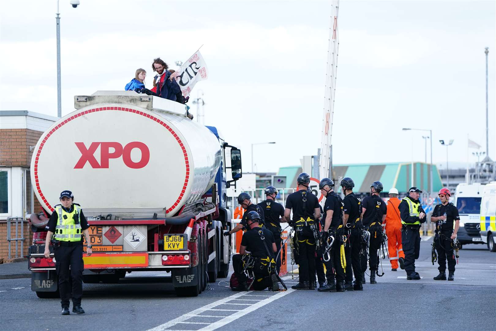 Police prepare to remove protesters from an oil tanker at the Ineos refinery in Grangemouth (Jane Barlow/PA)