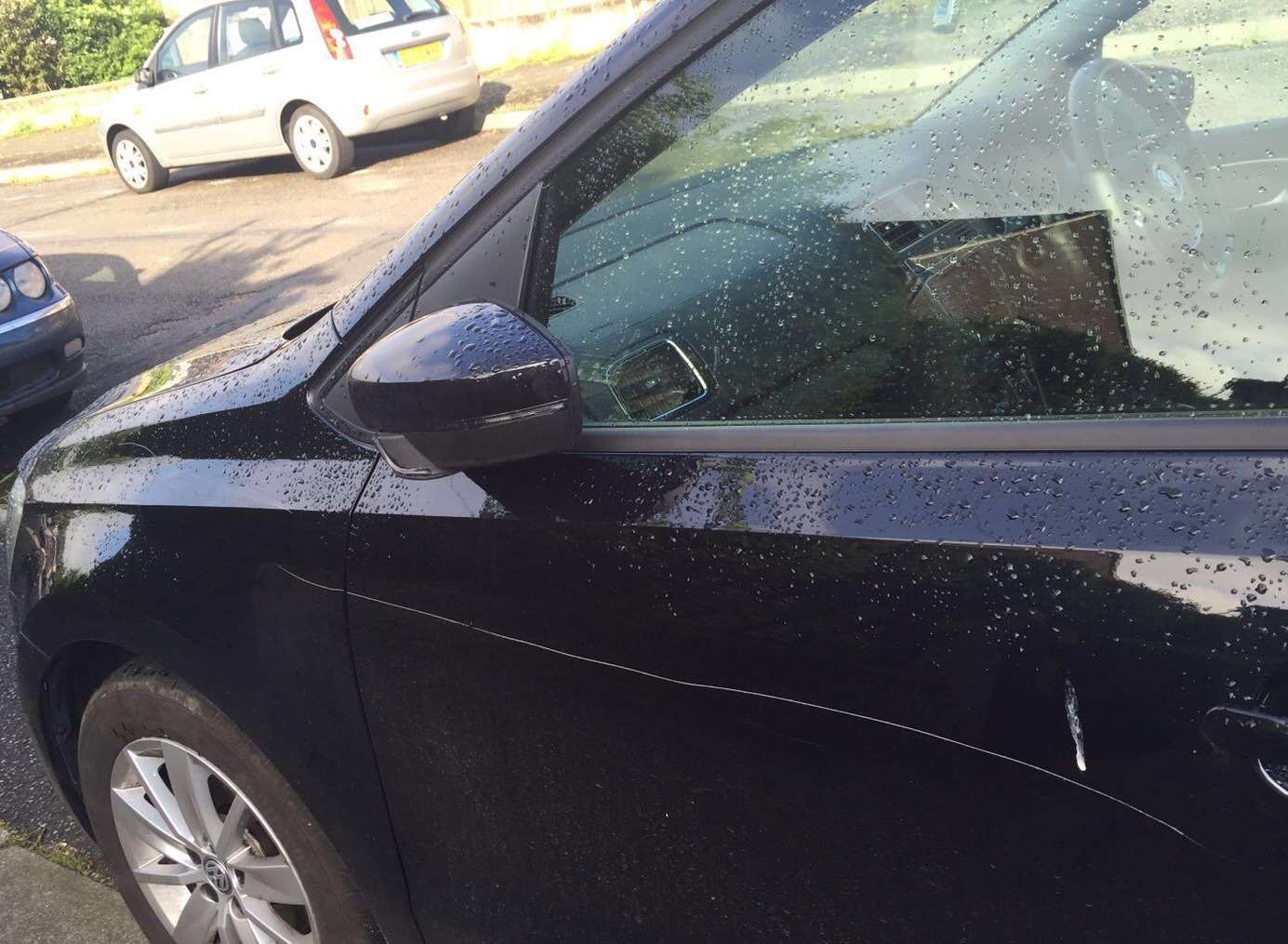 A car on St Aidan's Way, Gravesend, that has been keyed