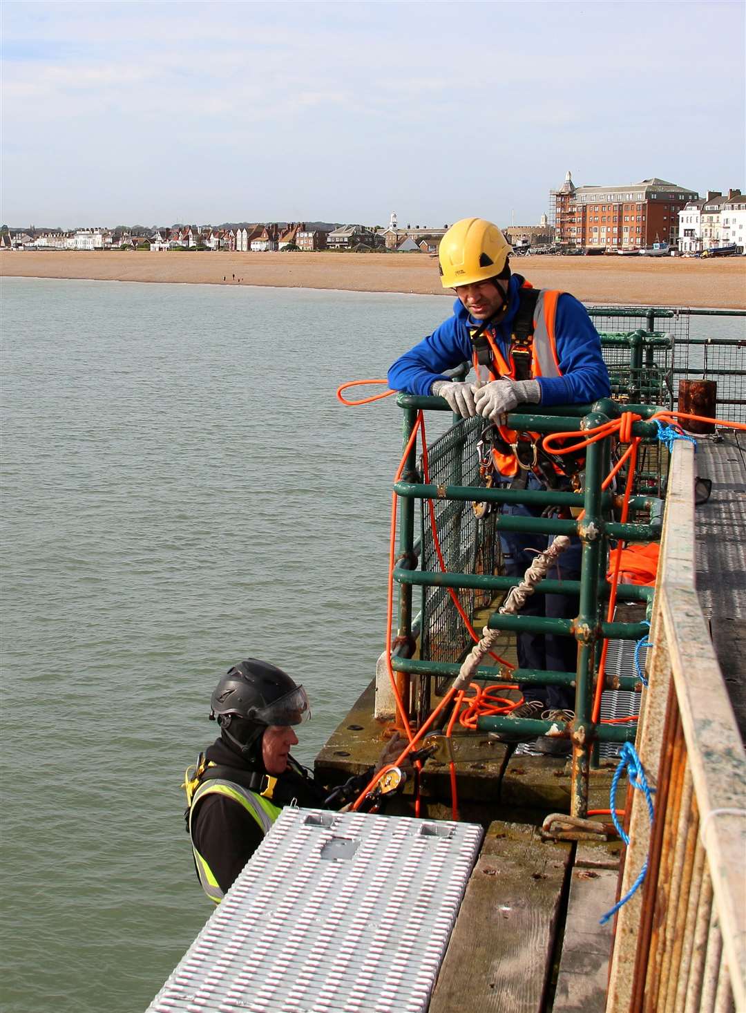 A worker starts the descent down Deal pier to check for repairs. Picture: Dover District Council