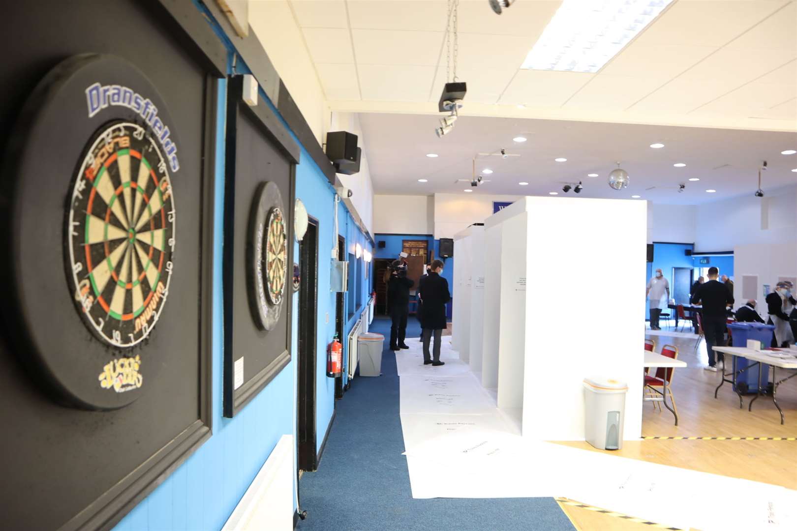 Unused dart boards inside the new-look Sheerness East WMC at Halfway which has become a covid test centre for those without symptoms