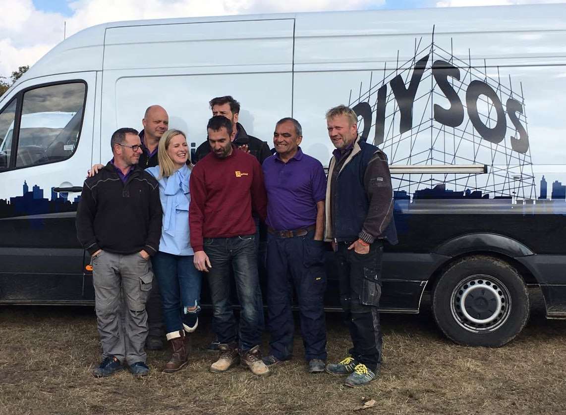 Dean Buckley, manager at Finesse Windows, with the DIY SOS team
