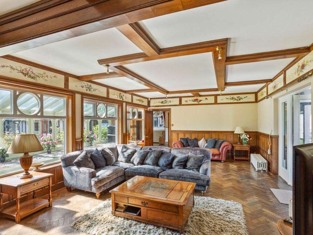 The four-bedroom boasts a spacious living-room punctuated by wooded ceiling beams. Photo: Farhad Berahman.
