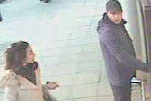 Police would like to speak to a man and a woman after an 82-year-old woman's purse was stolen