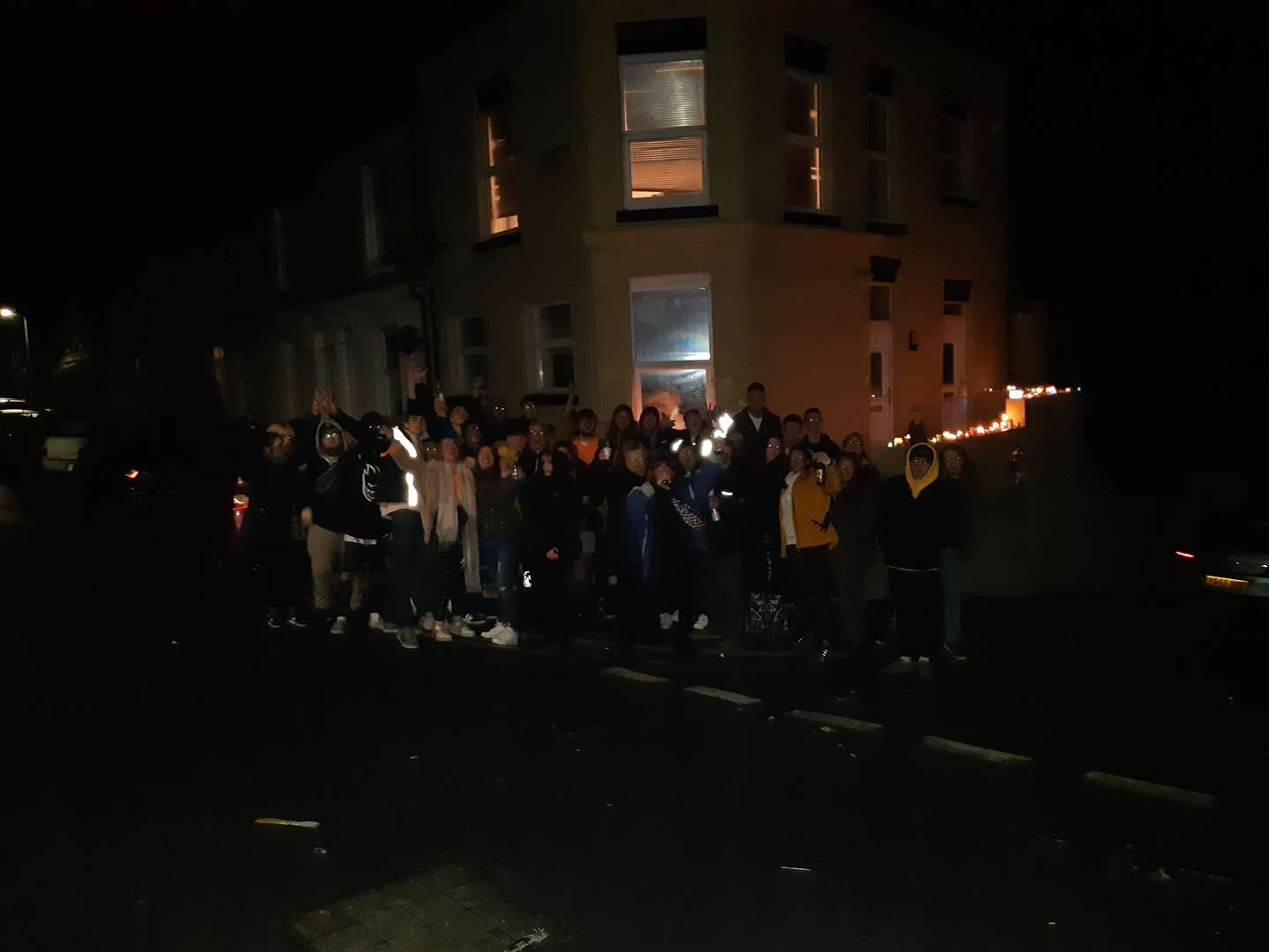 The vigil outside Mr Wilson's home within the first hour of New Year's Day.2020