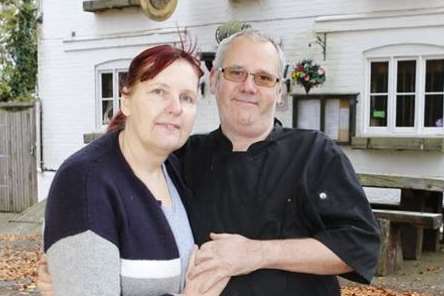 Kevin de Young, of The Ringlestone Inn, Harrietsham, who hit back at a customer's negative Facebook review. He's pictured with his partner Christina Warren.