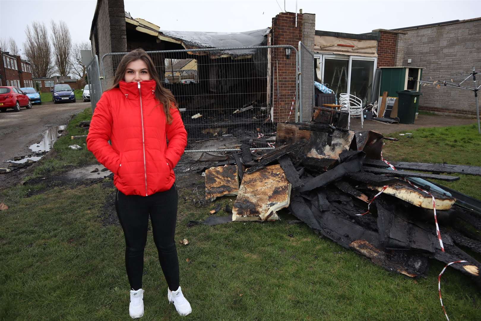 Deni Kerswell, 20, returns to the gutted remains of her chalet fire in Leysdown, Sheppey