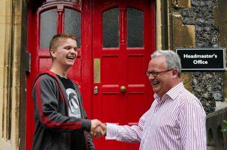 Dover College headmaster Gerry Holden congratulates student Richard Winstanley on his excellent A level results.