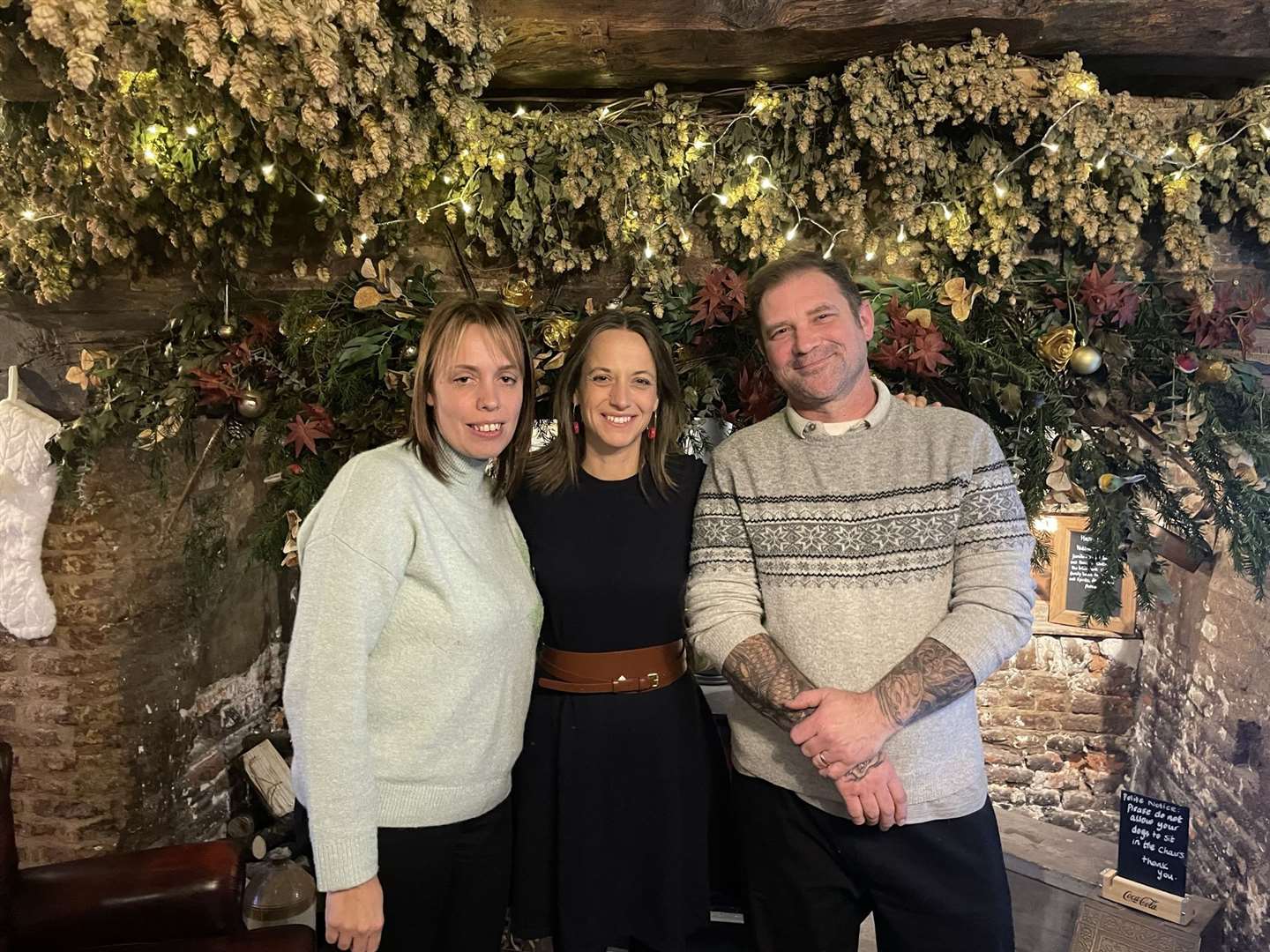 Landlords Claire Elliott and Dave Elliott lived at the pub in Newnham, pictured with MP Helen Whately, centre. Picture: Helen Whately