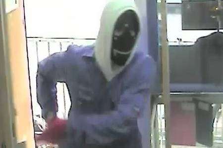 Police are hunting this man after a pawnbroker's was robbed in Chatham High Street