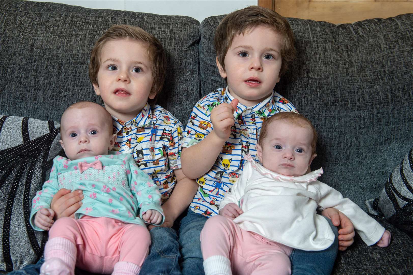 Two-year-old twins Harry and Elijah with their twin siblings Phoebe and Aria. Picture: SWNS