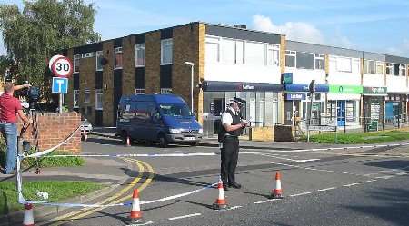 Police at the scene of the robbery. Picture: ALAN SMITH