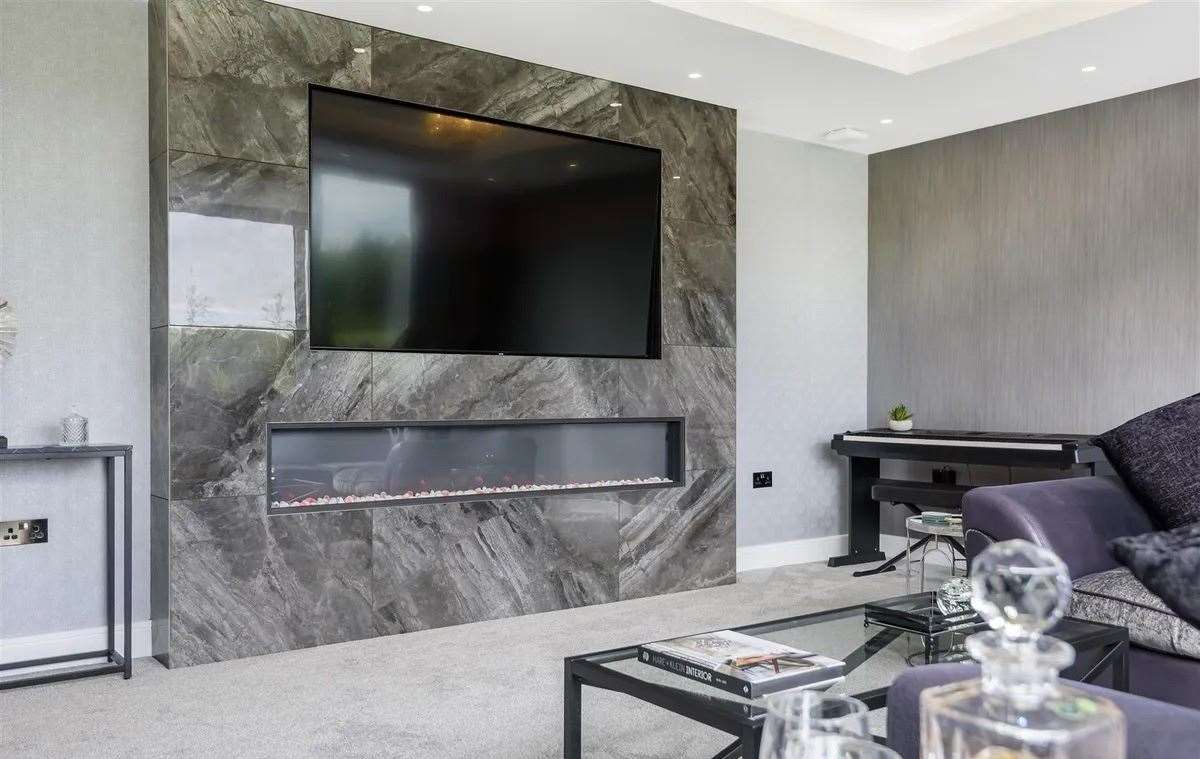 It's movie night every night with this 85” TV. Picture: Guildcrest Estates