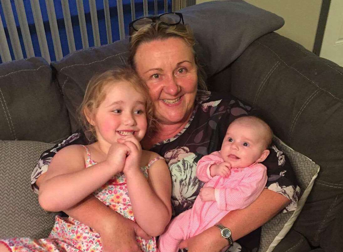Aileen Whatley with grand daughters Darcie, 4, and Aurora, six weeks.