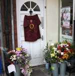 Floral tributes left at the scene of the alleged murder