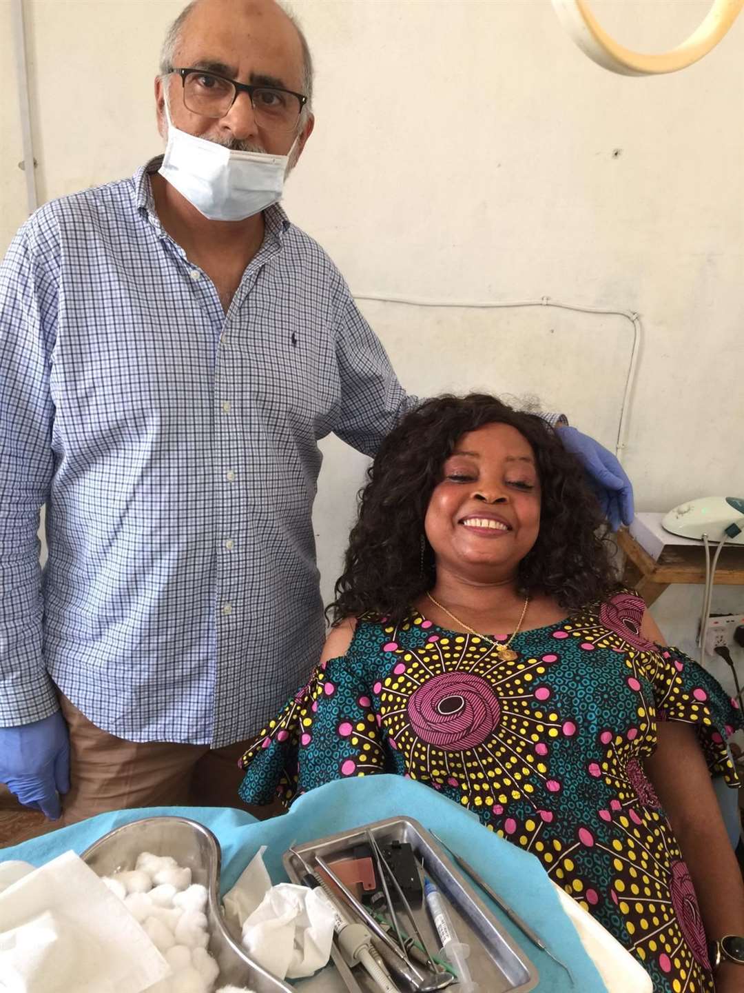 Dr Zahid Khan and a smiling patient