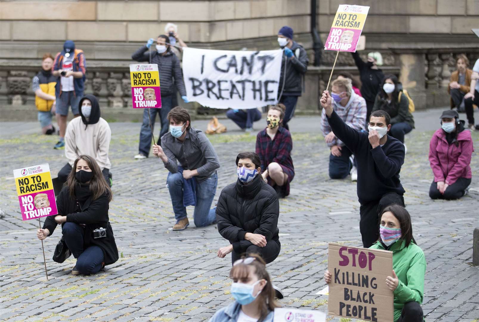 Demonstrators take part in the Take A Knee for George Floyd solidarity protest in Edinburgh (Jane Barlow/PA)