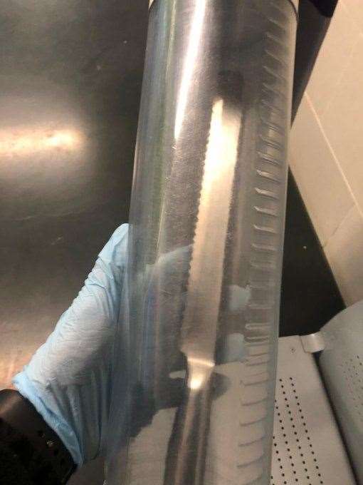 The seized knife safely placed in a container. Picture: Kent Police