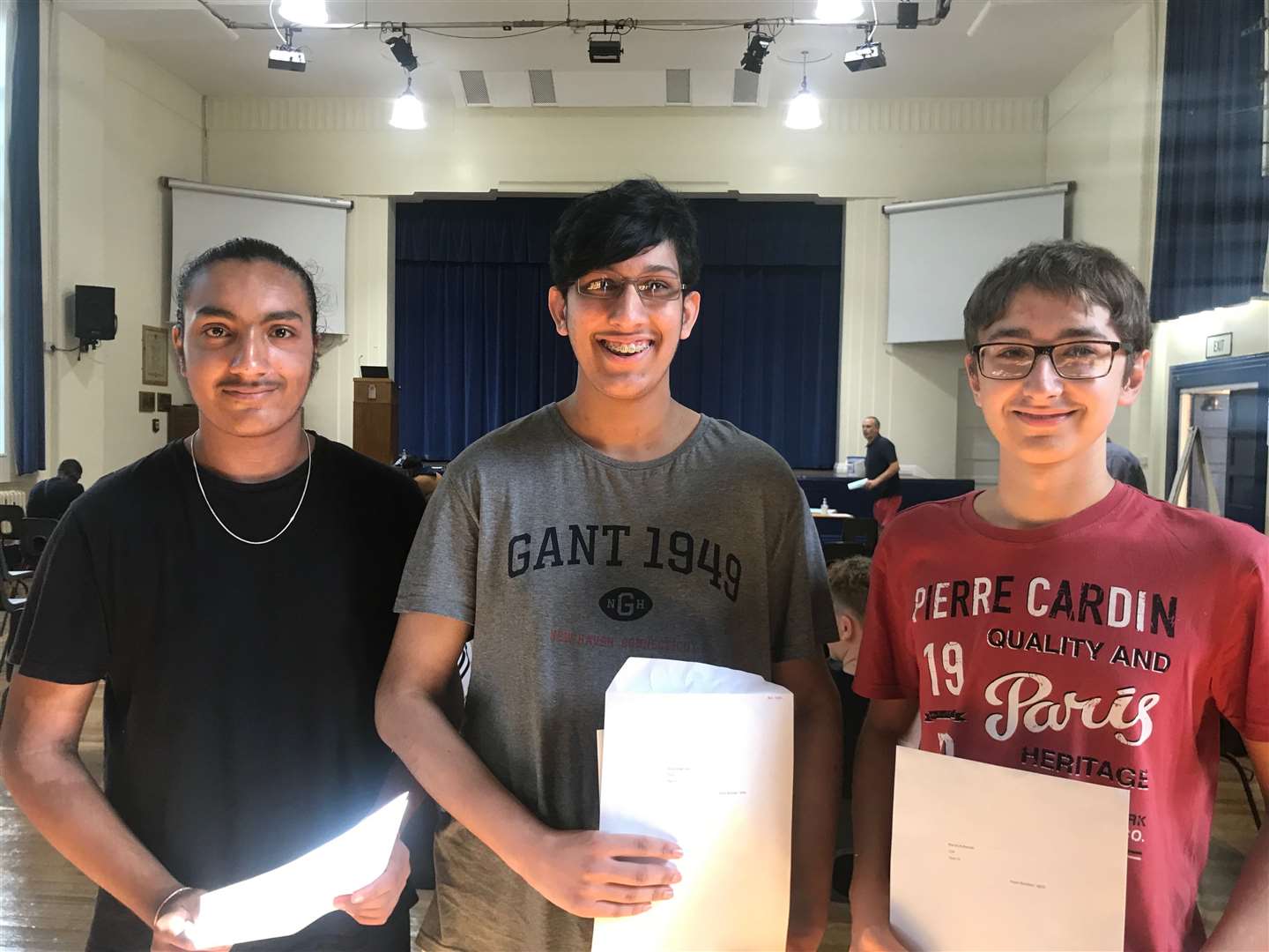 From left: Sach Thamdi, Arjun Juty and Maciej Rytlewski of Gravesend Grammar School picking up their results