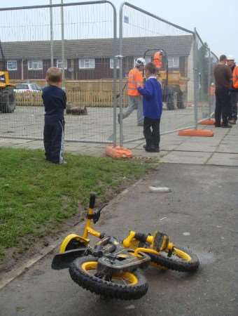 Children watch as workmen rip up their play area in Bredgar Close, Stanhope