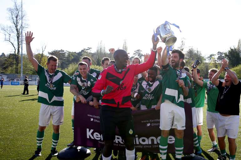 Ashford's players celebrate their Kent Reliance Trophy win over Cray Valley Picture: Andy Jones