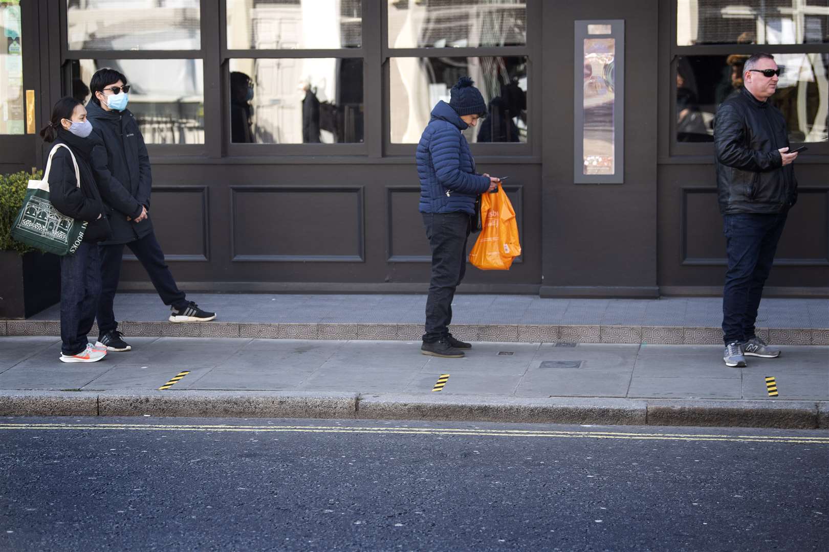 Retrofitting pavements to allow for social distancing could prove a challenge in some cities (Victoria Jones/PA)