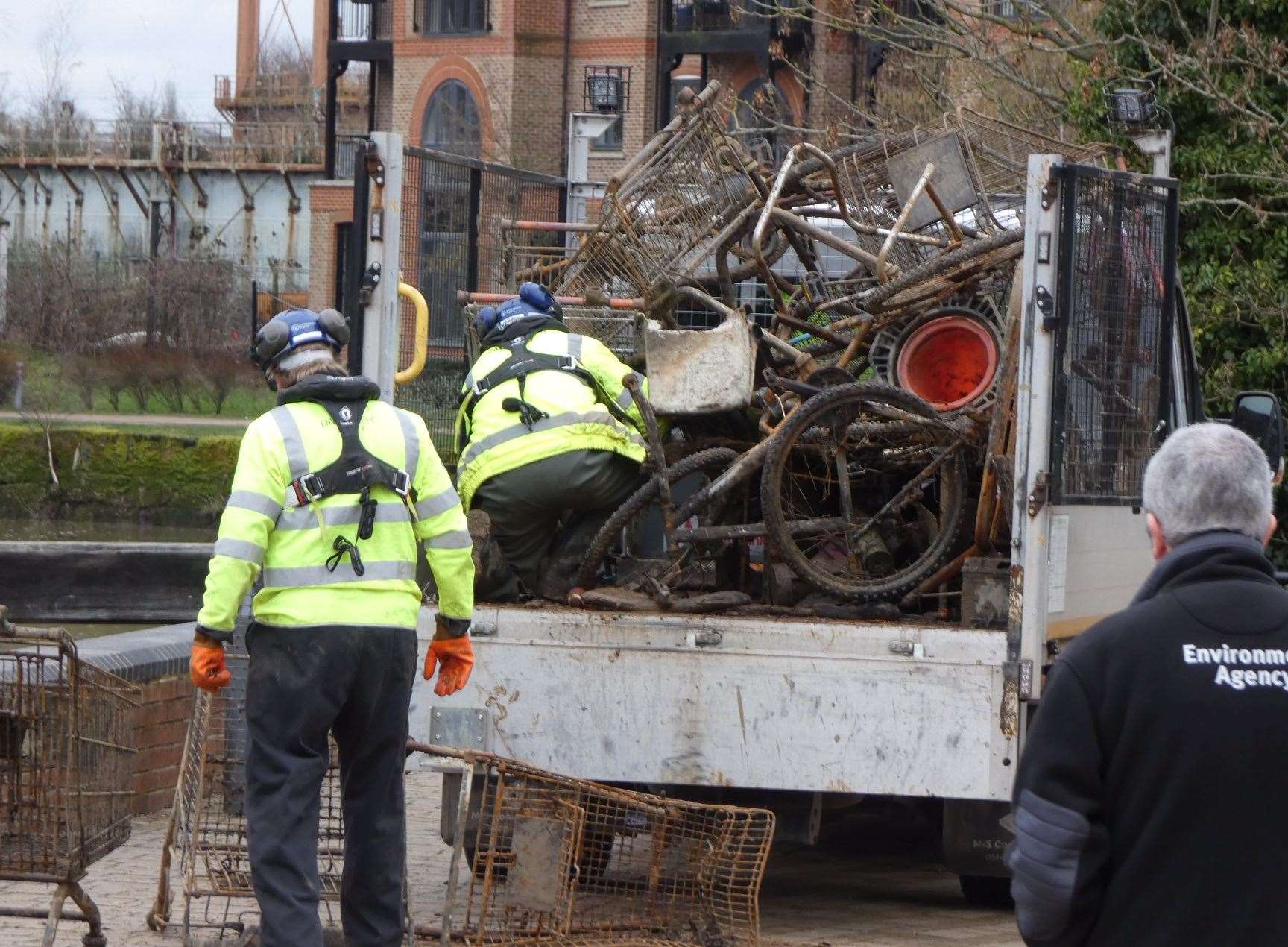 Environment Agency staff loading rubbish collected from a river clean up in 2021. Picture: TMBC