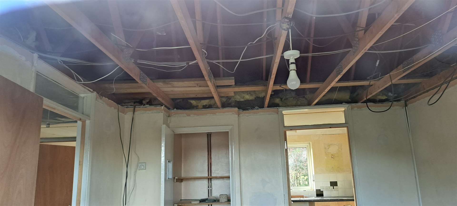 The property's ceilings have been removed