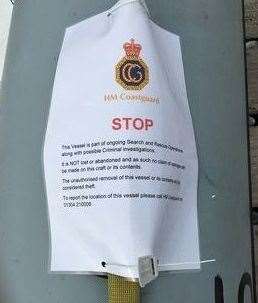 The Coastguard poster warns against removing the vessel which is still part of a criminal investigation