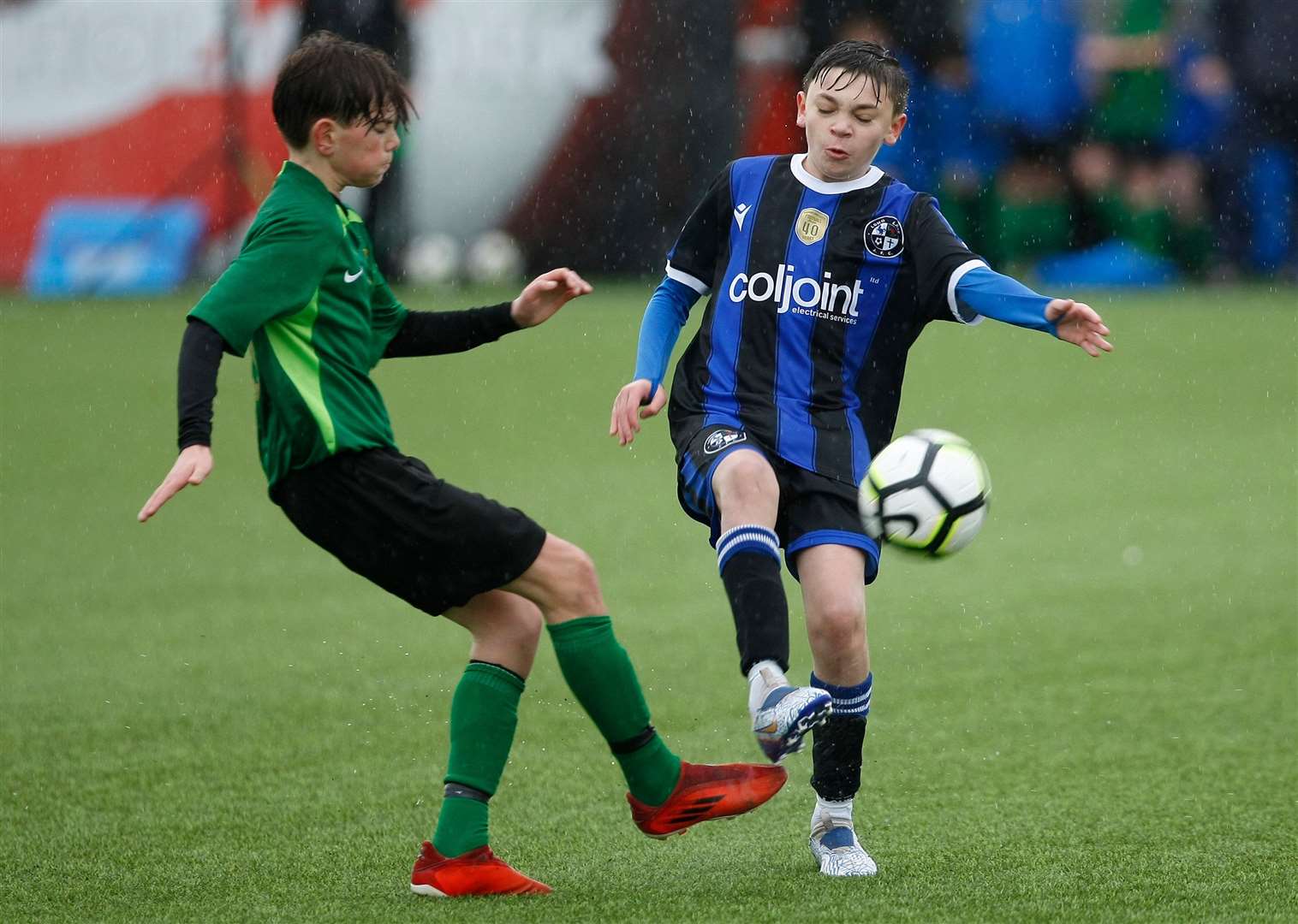 Sevenoaks Town under-13s compete with Long Lane under-13s (blue). Picture: PSP Images