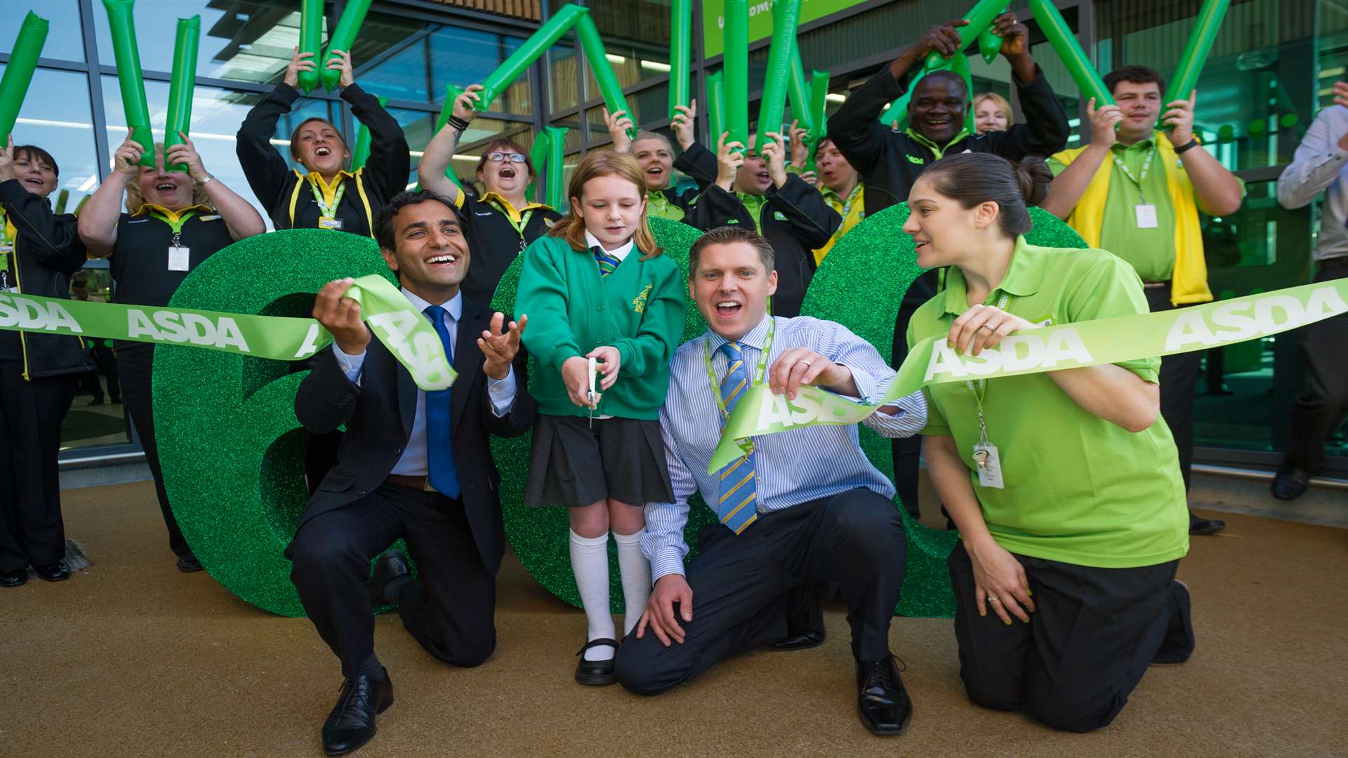 Corinne Howard, nine opening the Asda store at Gillingham Pier, alongside MP Rehman Chishti and store manager Chris Fawn and community champion Rosie Smith.
