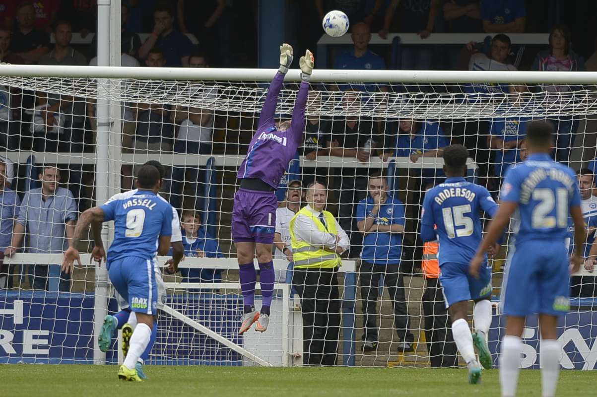 Gills keeper Stuart Nelson pushes a shot over the bar Picture: Barry Goodwin