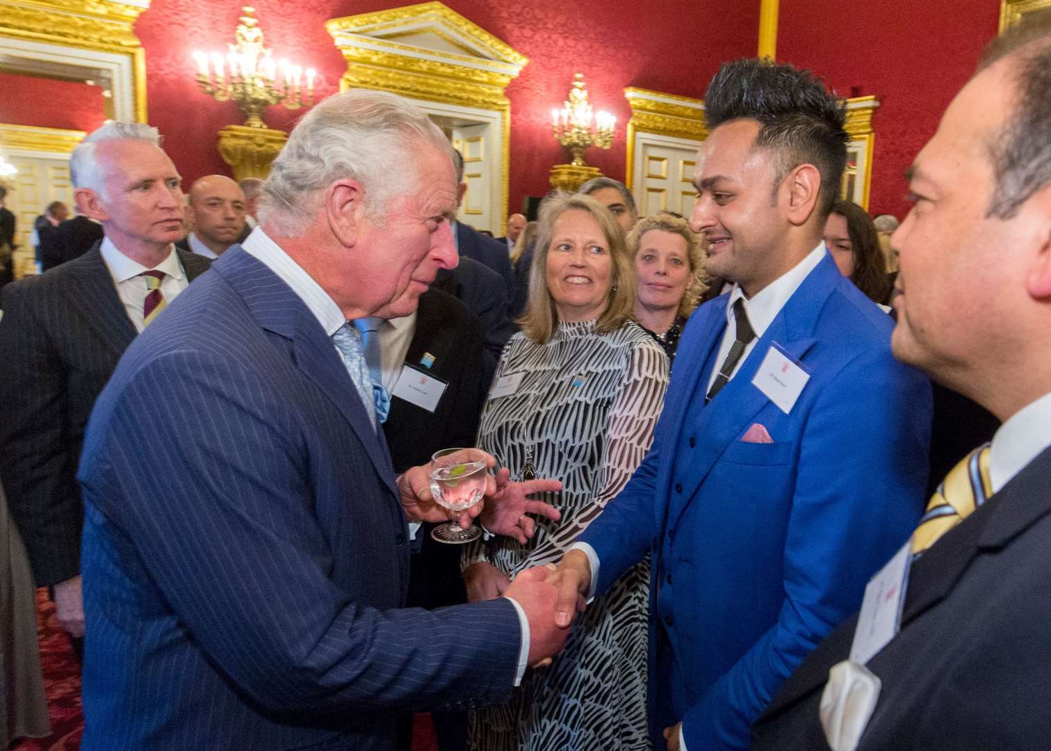 Amish Patel shaking hands with Prince Charles. Picture: Ian Jones Photography