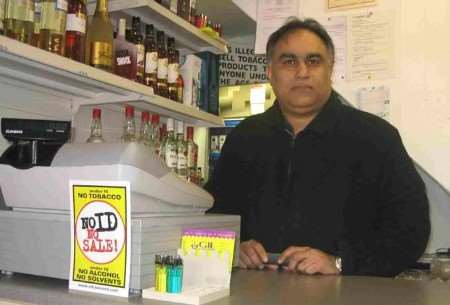 Mandeep Singh behind the counter of his store. Picture: GRAHAM RUSSELL