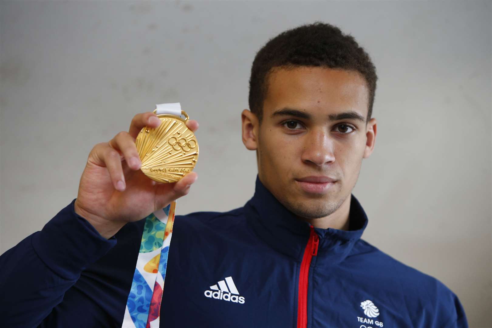 Sarah Clarke award winner Karol Itauma, with his gold medal from the Youth Olympics. Picture: Andy Jones