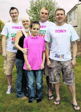 Gary with wife Hayley, son Aaron and fellow runners Tony and Vince