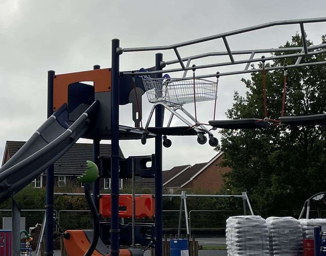 The trolley was stuck in the climbing frame. Picture: Trish Cornish