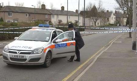 Police officers at the scene of the tragedy in December. Picture: JIM RANTELL