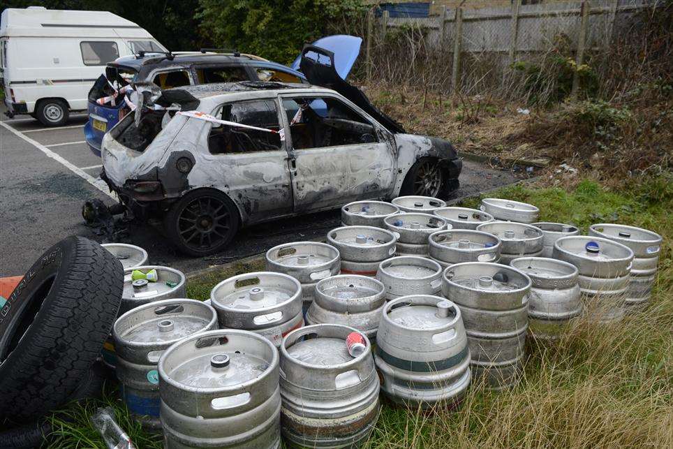 The burned out cars and rescued beer barrels at a pub car park fire in Folkestone.