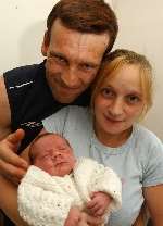 Baby Leo, with mother Claire Moore and her partner Steve Handley