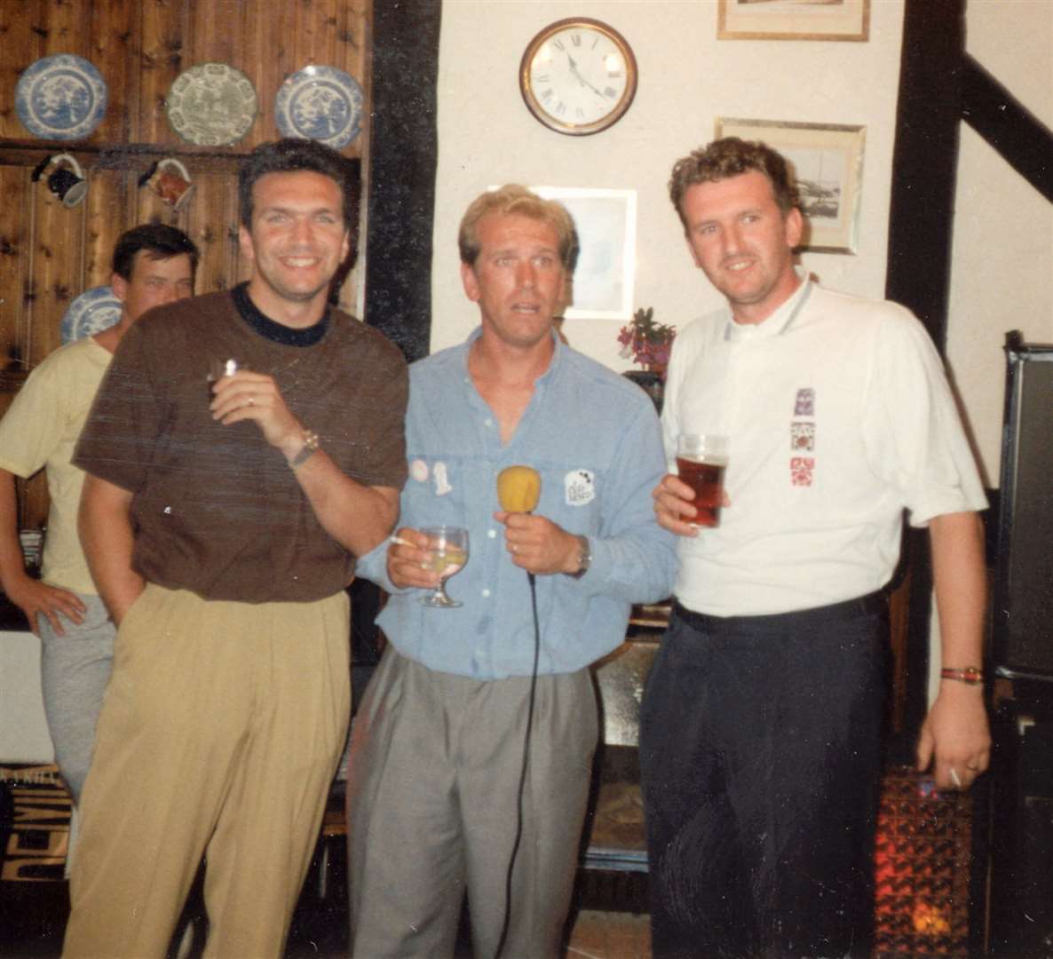 Neil 'Razor' Ruddock with his brothers singing karaoke in the Fox pub, Hythe Road, Ashford, in February 2004. The former footballer was among investors who helped it reopen as the New Fox Inn in 2019