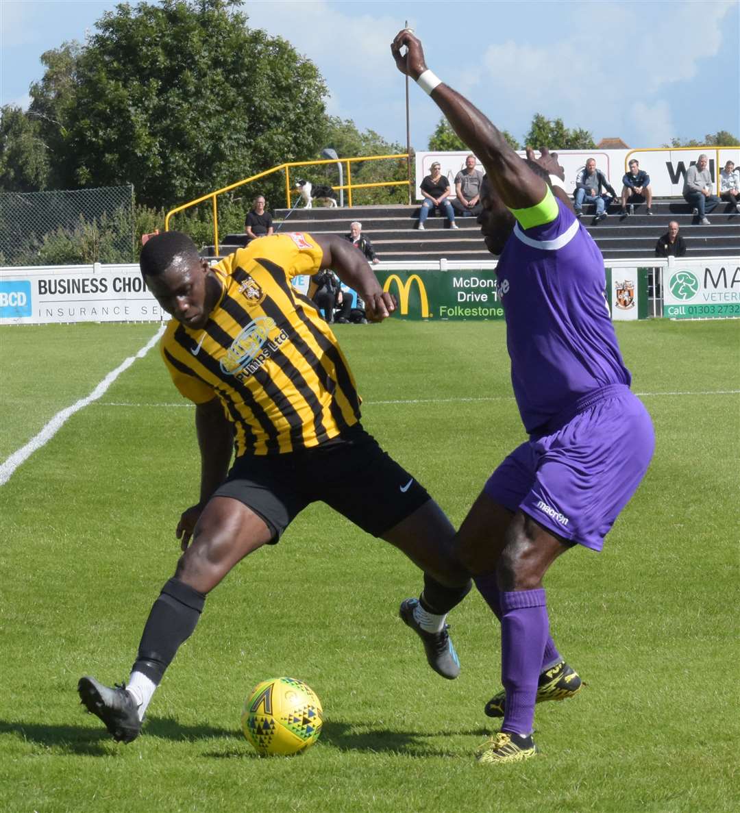 Ade Yusuff tussles with George Elokobi in Folkestone's friendly win over Maidstone Picture: Randolph File