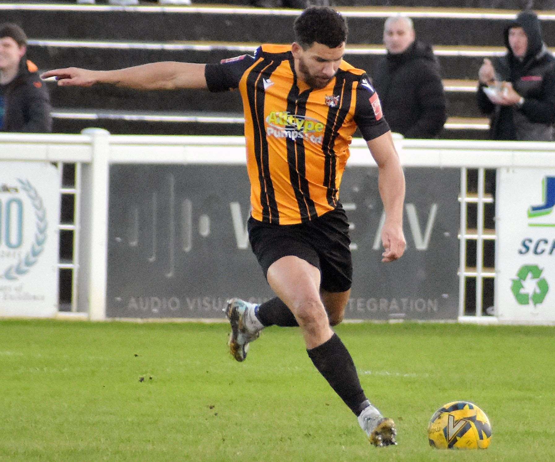 One of Folkestone's scorers Nathan Green sends the ball forward. Picture: Randolph File