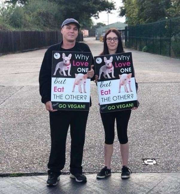 Robyn Murphy, right, with her dad at a protest outside a pig slaughter house in Essex. Picture: Robyn Murphy (22093462)