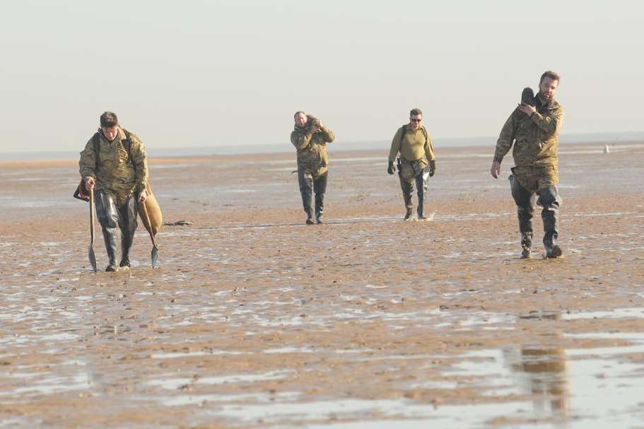 Royal Navy officers return to shore at Minster Leas. Picture: Steve Crispe