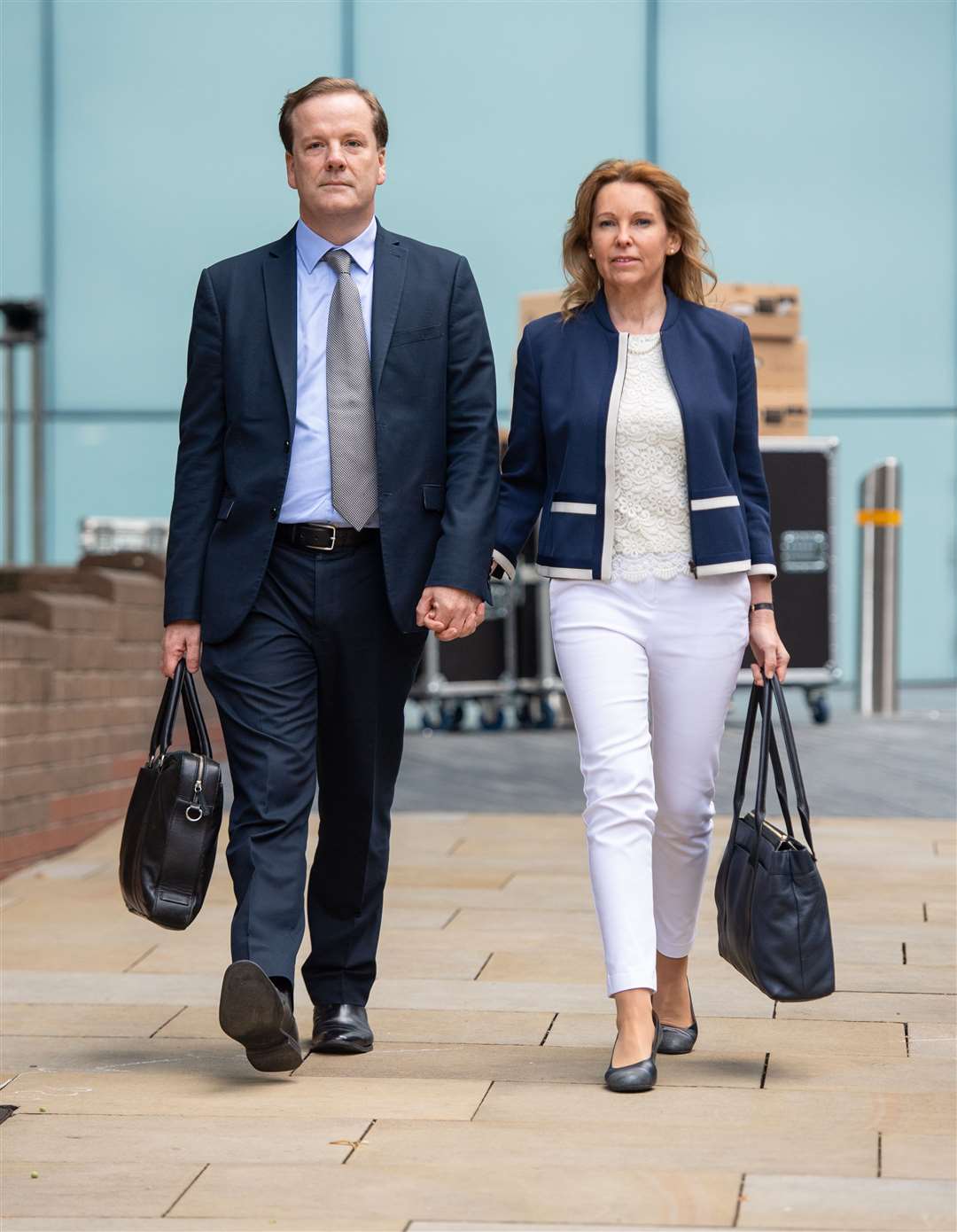 Charlie Elphicke arriving at Southwark Crown Court alongside wife Natalie Elphicke, his successor as MP for Dover (Dominic Lipinski/PA)