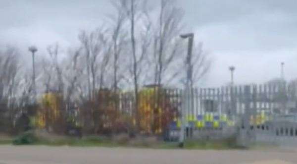 A video on Twitter shows numerous police cars gathered in a school park in Dover this morning